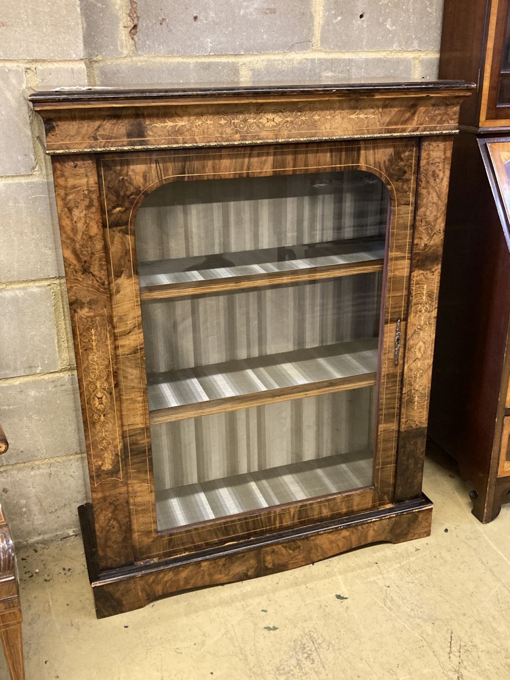 A late Victorian inlaid walnut pier cabinet, width 85cm, depth 31cm, height 109cm